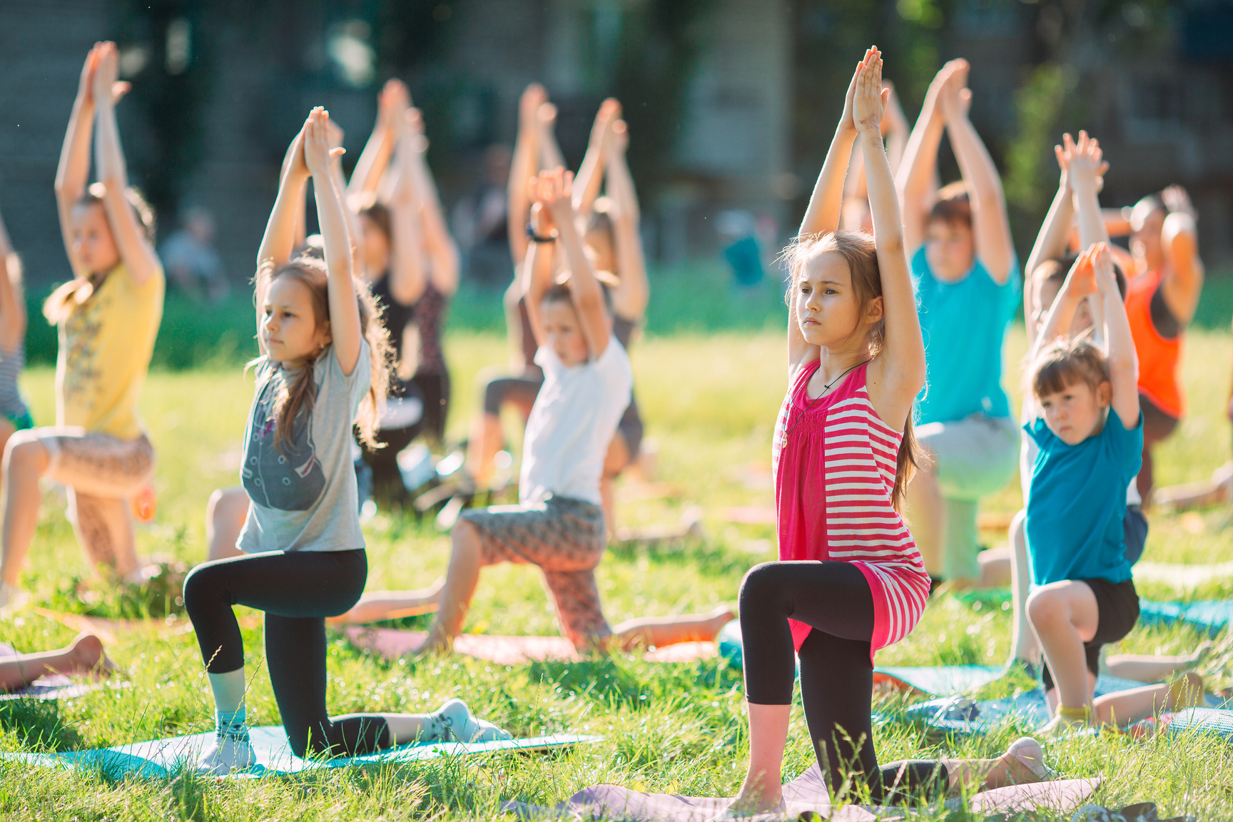 Yoga classes outside on the open air. Kids Yoga,